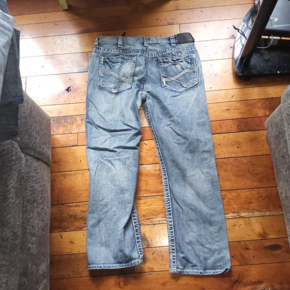 Black distressed designer jeans. Straight relaxed fit. 38 x 32. Great condition
